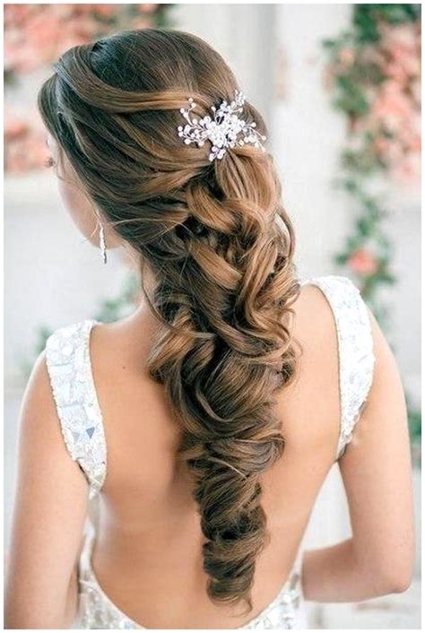 Secure the front and ends of the braid with a ponytail holder, and twist up the remaining hair into a few twists. 59 Prom Hairstyles To Look The Belle Of The Ball | Hairstylo