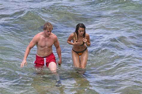 She's best known for her role in marvel's agents of s.h.i.e.ld. chloe bennet in a bikini with logan paul in Hawaii-050717_18