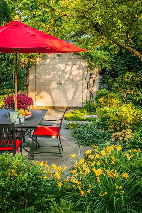 Ornamental grasses steal the show. Garden Tour: Backyard Rain Garden | Rain garden, Backyard ...