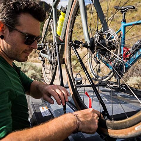 Advise using a cable lock as a back up to the integrated locking mechanism. Swagman UPRIGHT Roof Mount Bike Rack - Bikespedia