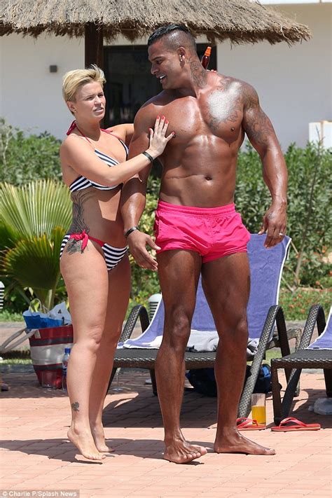 Thank you for submitting your comment! Kerry Katona dons bikini while packing on the PDA with ...