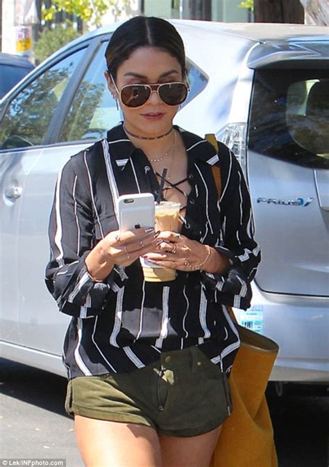 Wearing panties is not allowed in my house! Vanessa Hudgens forgets to zip up her tiny green shorts in ...