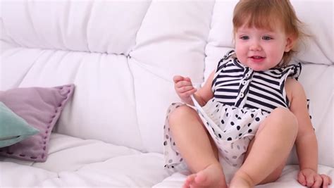 A global marketplace for images, videos and music. Barefoot Little Girl in Dress Stock Footage Video (100% ...