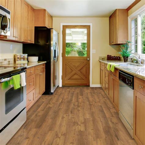 Durable vinyl planks offer the appearance of real pine flooring. Trafficmaster Vinyl Plank Are Bad - Khaki oak ...