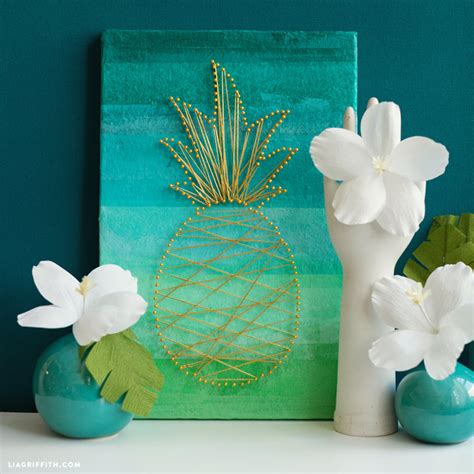 Whether you are looking to revamp your furniture or just add some art to your walls, these tutorials will help you create a polished look. DIY Tropical Wall Art - Lia Griffith