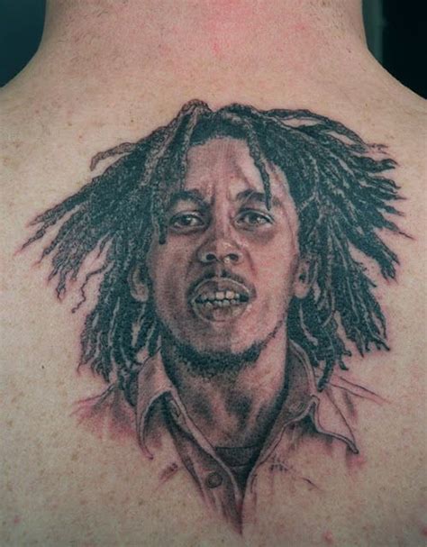 Angel wing tattoo on back of neck. Bob Marley Tattoos | Tattoo Bob Marley Nas Costas Pank | Bob marley tattoo, Bob marley, Tattoo ...