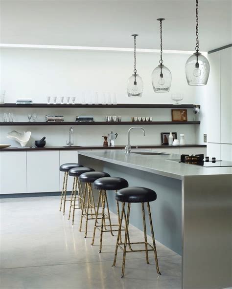 Though engagement with stakeholders and both local and global issues this is designed to redefine the role of the designer in the context where we are working and lay the. RU designed kitchen with bamboo bar stools and bubble lanterns #kitchen #leather #lighting # ...
