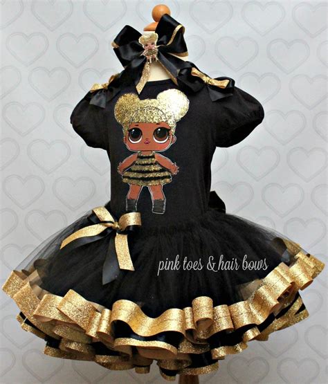 She wears a glittery gold and black striped dress, and black sneakers. Queen bee lol surprise doll tutu set-Queen bee lol ...