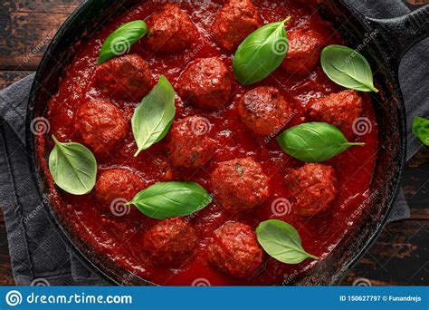 Cocktail meatballs are the ultimate party appetizer. Homemade Meatballs In Iron Cast With Sweet And Hot Tomato ...