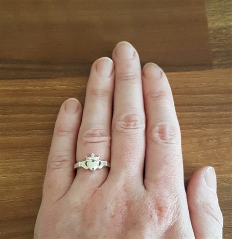 Long before social media updates, people wore the famous claddagh design to express relationship status. How to Wear the Claddagh Ring Complete Guide - Tracy ...