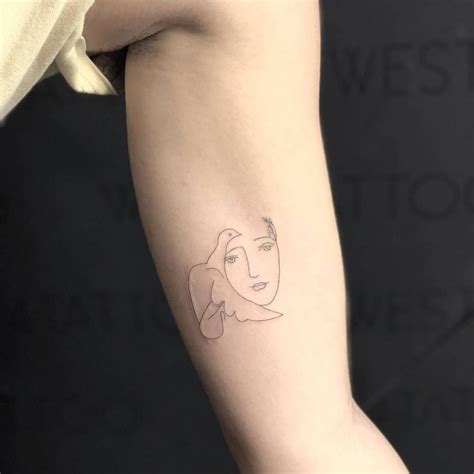 Painless and easy to apply. Picasso's Le Visage de la Paix tattoo on the left inner ...