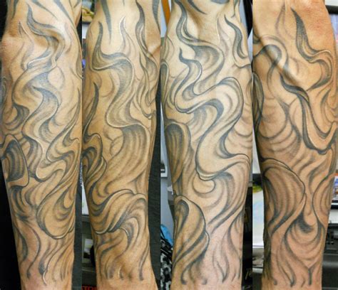 21 smoke tattoo designs ideas design trends premium. flame/smoke tattoo sleeve | Skull hand tattoo