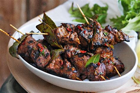 Serve with fennel fronds, a drizzle of olive oil and lemon Lamb espetadas