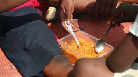 How to prepare party jollof rice the nigerian way. SYDNEY, AUSTRALIA - APRIL 2014: Close-up Shot Of Making ...