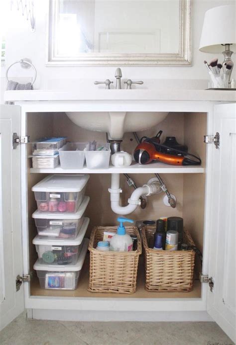 The bathroom is associated with the weekday morning rush, but it doesn't have to be. Under sink bathroom cabinet organization - extra shelf ...