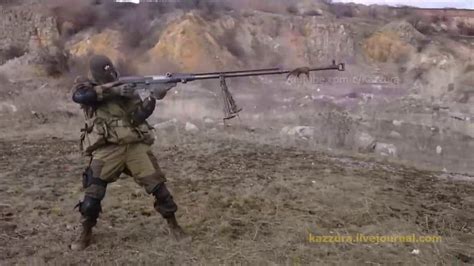 They invaded out of uniform, showing no flag, killing civilians, under cover of russian government lies and propaganda. Shoulder Firing a PTRS-41 (Simonov anti-tank rifle) Like a ...