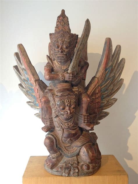 This barong creature is a combination between the lion or the tiger (body, legs, eyes), eagle, elephant, and dragon (grinning. STATUE BARONG ET RANGDA periode 1850-1936 | Patung ukiran ...