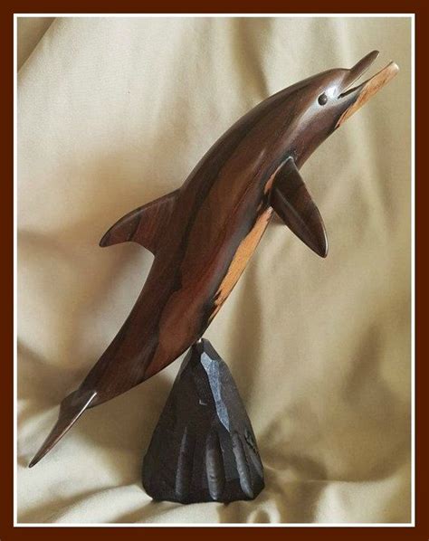 We have a large collection of handmade souvenirs made in indonesia. Dolphin Statue , Hand Carved Dolphin, Wood Dolphin ...