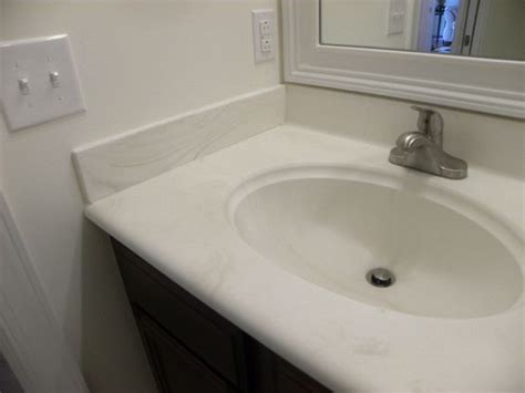 Oval undermount sink, american standard optum 22 small bathroom design ideas blending functionality and style. Carrera cultured countertop in bathroom | Bath countertops ...