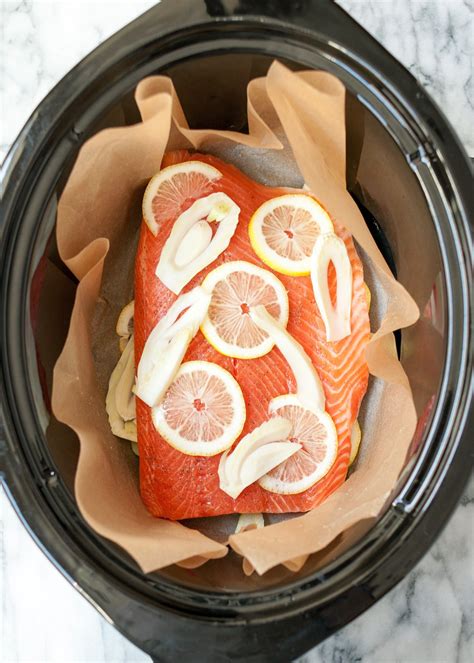 Line the slow cooker with parchment paper before cooking so you can easily lift out the salmon in one piece once its done. How To Cook Salmon in the Slow Cooker | Recipe | Slow ...