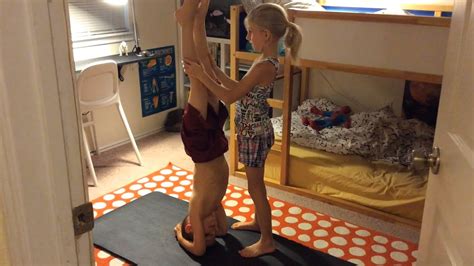 Maybe you would like to learn more about one of these? Kids Practicing Headstand Yoga Pose - YouTube