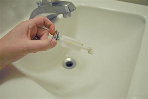 Ok.so i understand that many bathroom sinks don't have stoppers, so i picked one up at walmart today. How to put a sink drain stopper back in - IAMMRFOSTER.COM