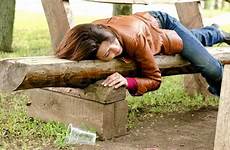 drunk sleeping bench woman