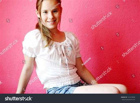 Dressed in pink dress in studio on white background. Beautiful Blondhaired 13years Old Girl Portrait Stock Photo 141474856 - Shutterstock