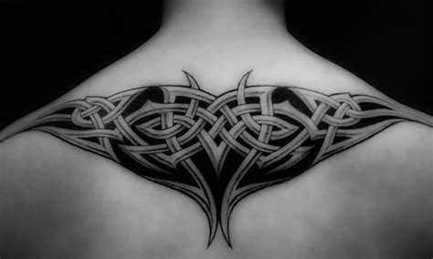 The cross has been one of the widely used and most recognized symbols in the world. Tattos Tattos: upper back tribal tattoos for men