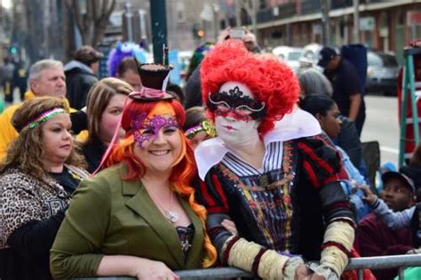 Parades are a huge part of the festivities, and there are dozens of them. Mardi Gras Party Goers Pose for Us on Bourbon Street...