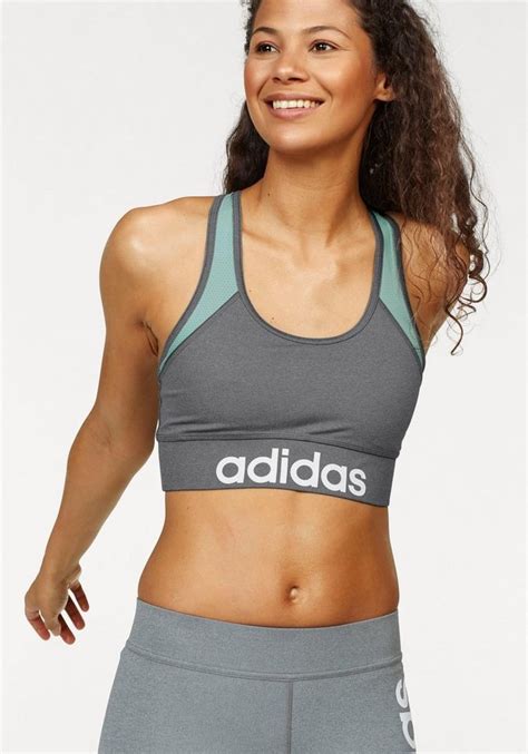 Zonder sportbeha riskeer je weefselschade en rugpijn. adidas Performance Sport-BH »LINEAR BRA«, Sport-BH von ...