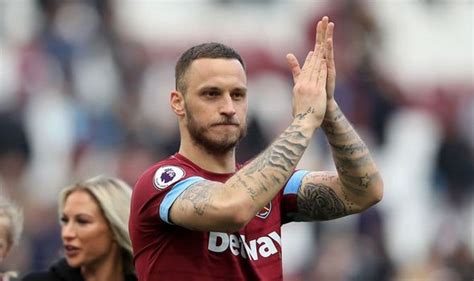 Tattoos, black hair and silicone breasts. Marko Arnautovic closes in on £22m China move after ...