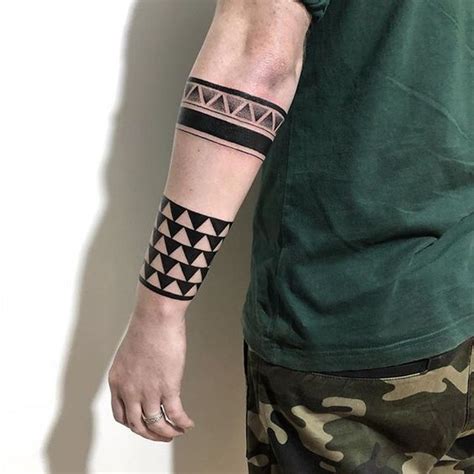 Where should you get an armband applied? Warrior band Tattoo | Band tattoo, Wrist band tattoo ...