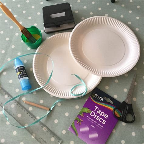 Stage 1 to make your easter bunny mask paint the paper plate brown and allow to dry. How to Make a Paper Plate Easter Basket - Blissful ...