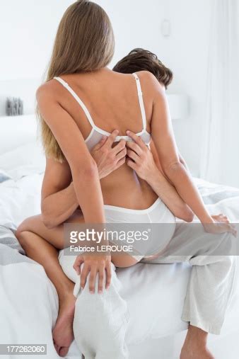 And each of our souvenirs tells a story. Romantic Couple On The Bed Stock Photo | Getty Images