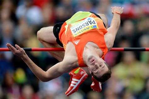 They were converted to metric before being ratified as world records. Britain's Tom Parsons competes in the men's high jump final