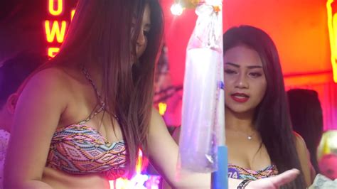 As the sun sets in bangkok, the red light districts become alive. Thailand girl red | Soi Cowboy Bangkok Red Light District ...