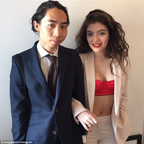 White guy and his asian girlfriend. Lorde beams with boyfriend James Lowe before New Zealand ...