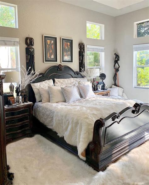 The guest bedroom is another room that strays from the color palette in the rest of the home. Bedroom decor | African inspired decor, Decor, Bedroom decor