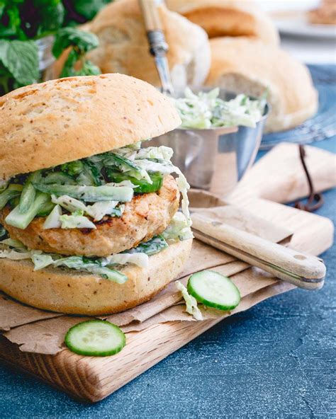 Coat or marinade chicken thighs and breast to create the perfect filling for juicy burgers. Indian Chicken Burgers where have you been all my life! Topped with a refreshing yogurt cucumber ...