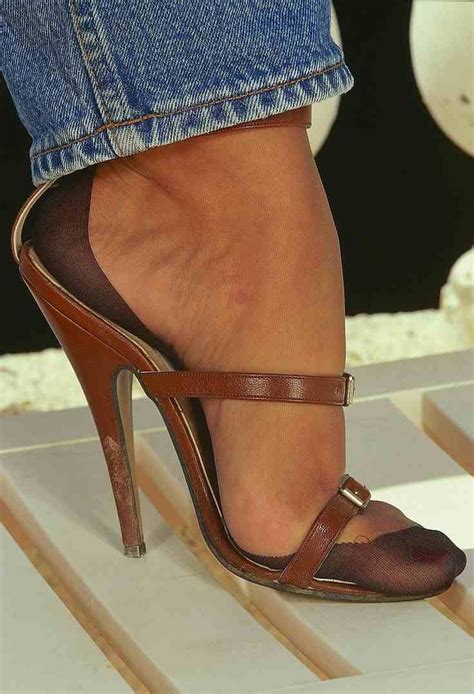 She could also have used the 'front' of the shoe to insert, rather than the heel. Pin on TANYA TRANNY FEET