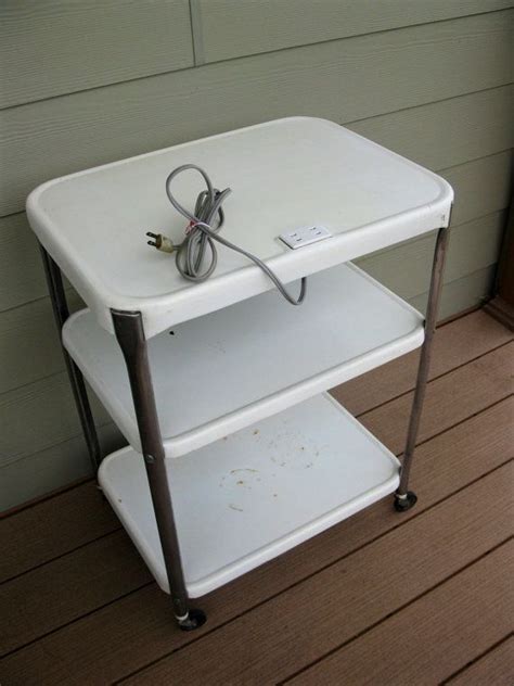 Three drawers fit beautifully into the demi lune top, though are not on runners. Vintage COSCO Rolling Cart metal 3 Tier 3 shelf white ...