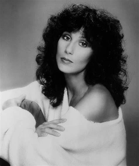 Please download one of our supported browsers. Promotional studio portrait of American actor and pop singer Cher, wearing an off-the-shoulder ...