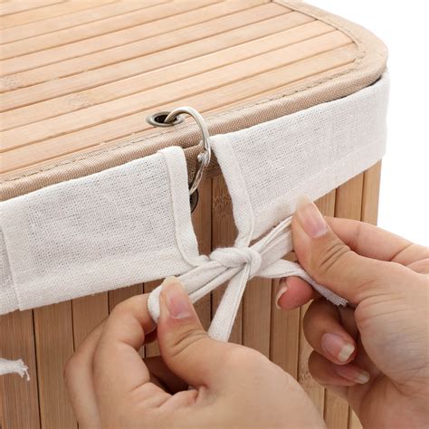 A contemporary laundry hamper that combines style with functionality. Bamboo Laundry Hamper