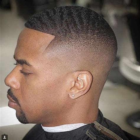 Jul 09, 2021 · because the very short high fade haircut blends at a faster rate and generally requires a number 0, 1, or 2 clipper size, this taper fade focuses your eyes on the longer hair on top. taper-fade-haircut-with-beard-5 | Waves haircut, Fade ...