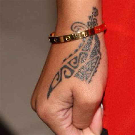 As we have said, the singer his first tattoo done at the age of eighteen. tribal | Hand tattoos for women, Tribal hand tattoos ...