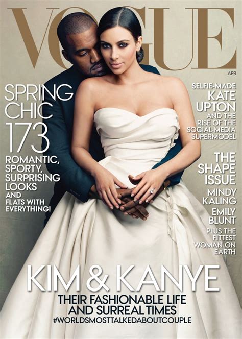 Kim kardashian and kanye west look like they're about ready for their wedding on the cover of vogue magazine's april 2014 issue. Kim Kardashian and Kanye West cover Vogue US April 2014