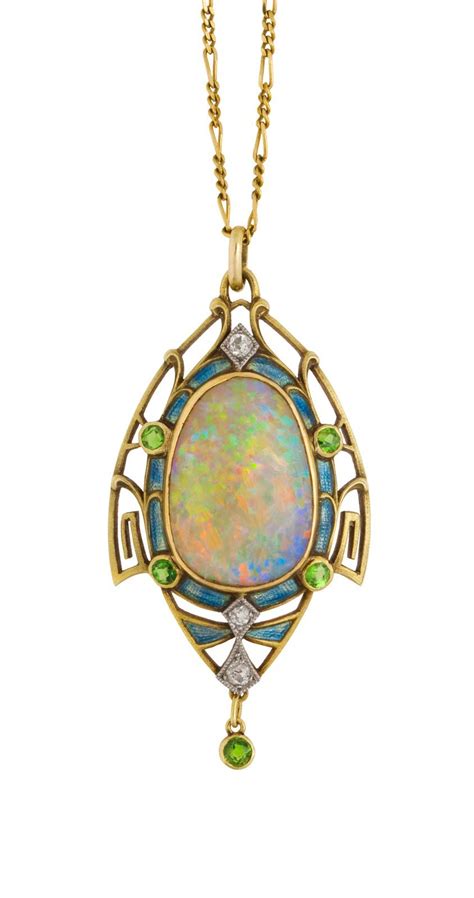 Me jewellers (03) 9621 1122. Opal, green garnet, enamel, gold. Mary Titchener Antique ...