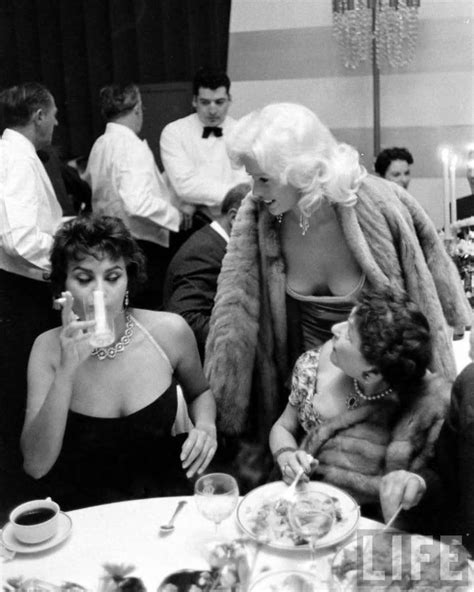 It's the most famous side eye ever caught on camera: Film Noir Photos: Out on the Town: Sophia Loren and Jayne Mansfield