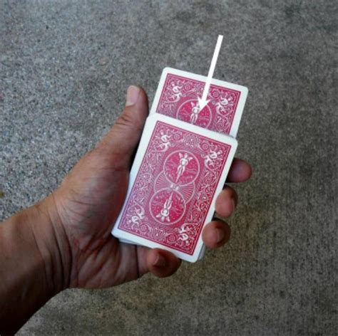Place the index finger of your other hand on top of the deck, wiggle is just a bit as the pinkie of that hand pushes the card up from the back of the deck. Learn the World's Best Easy Card Trick | Easy card tricks, Simple cards, Card tricks